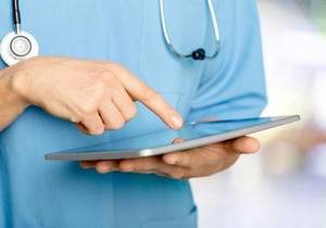 Healthcare professional using tablet