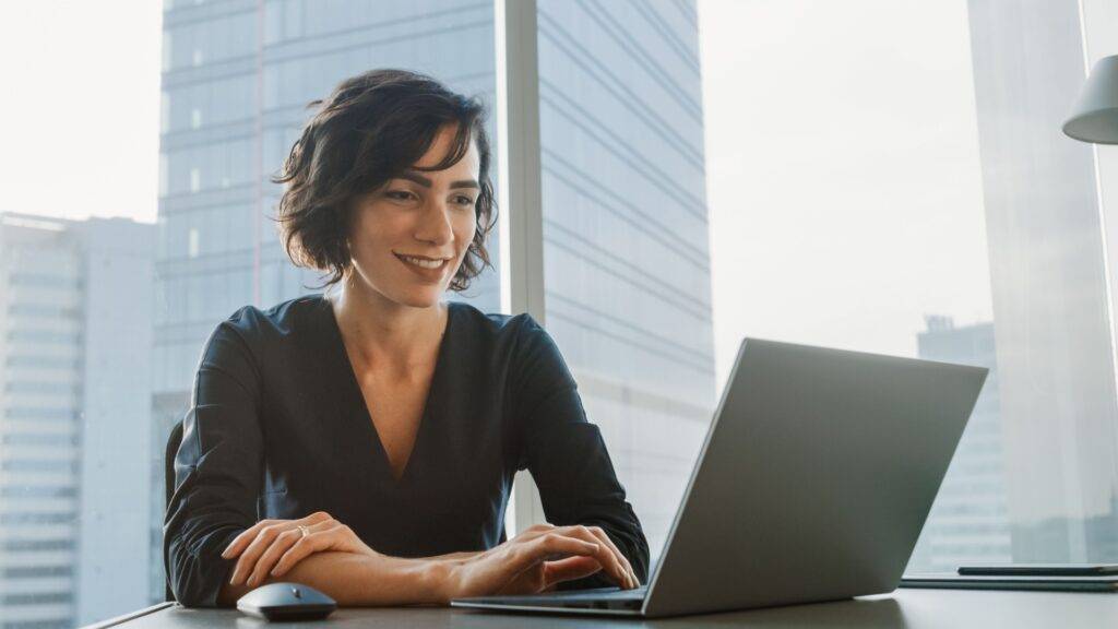 Female professional working at her laptop