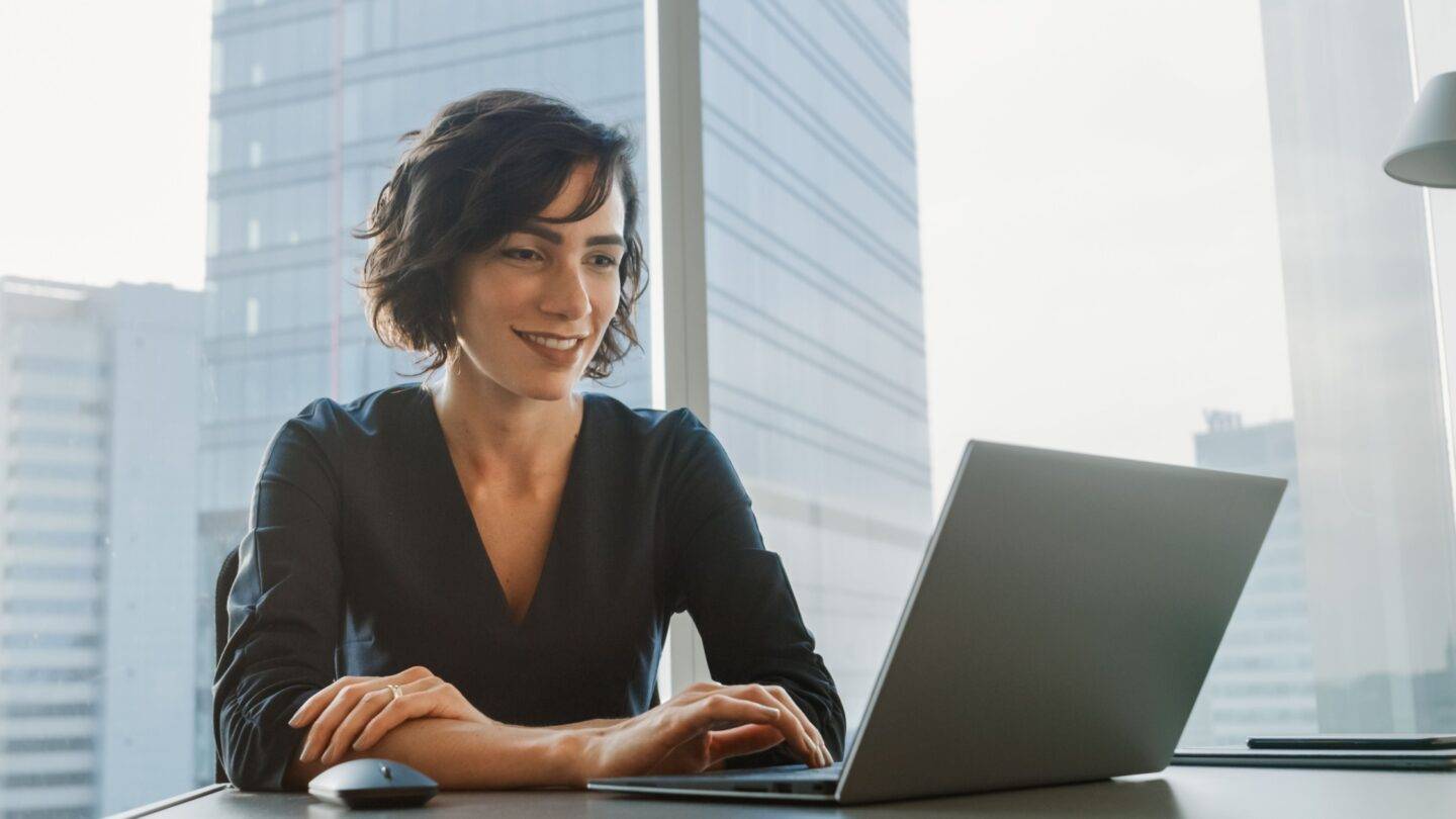Female professional working at her laptop