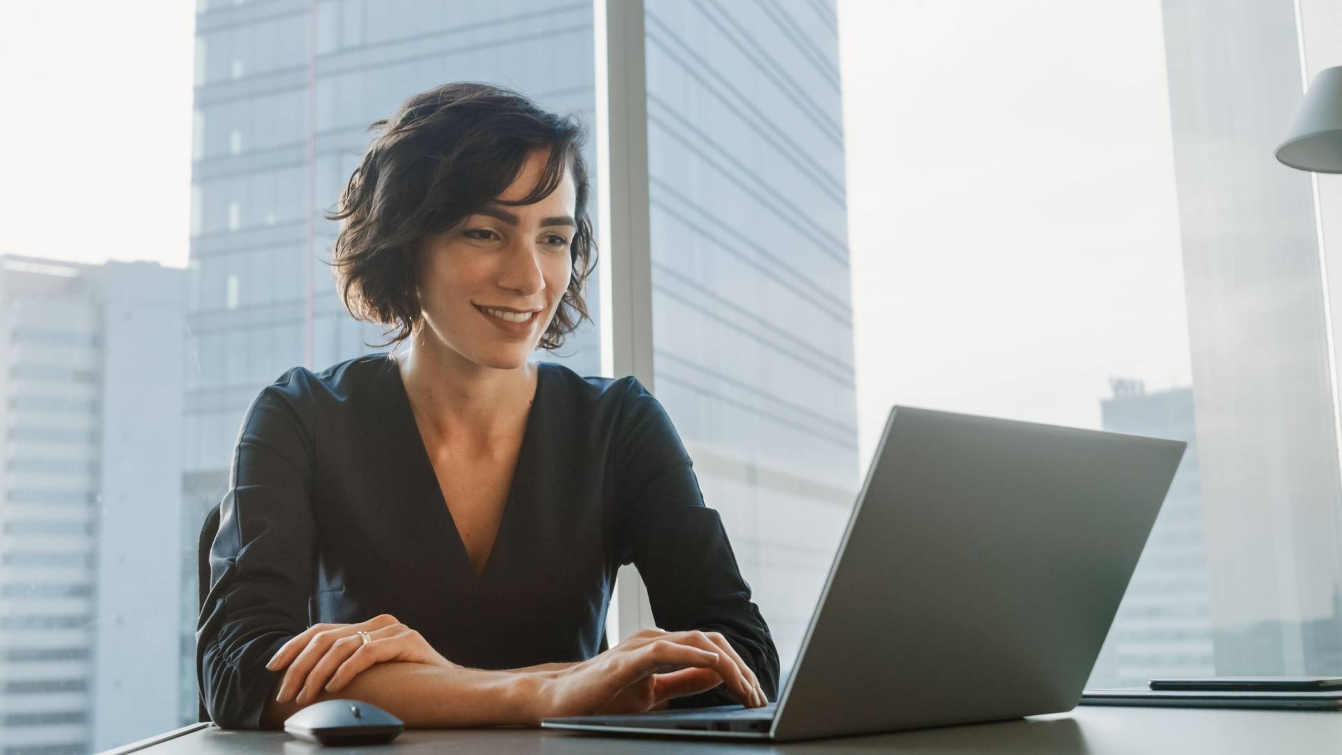 Female professional working at her laptop