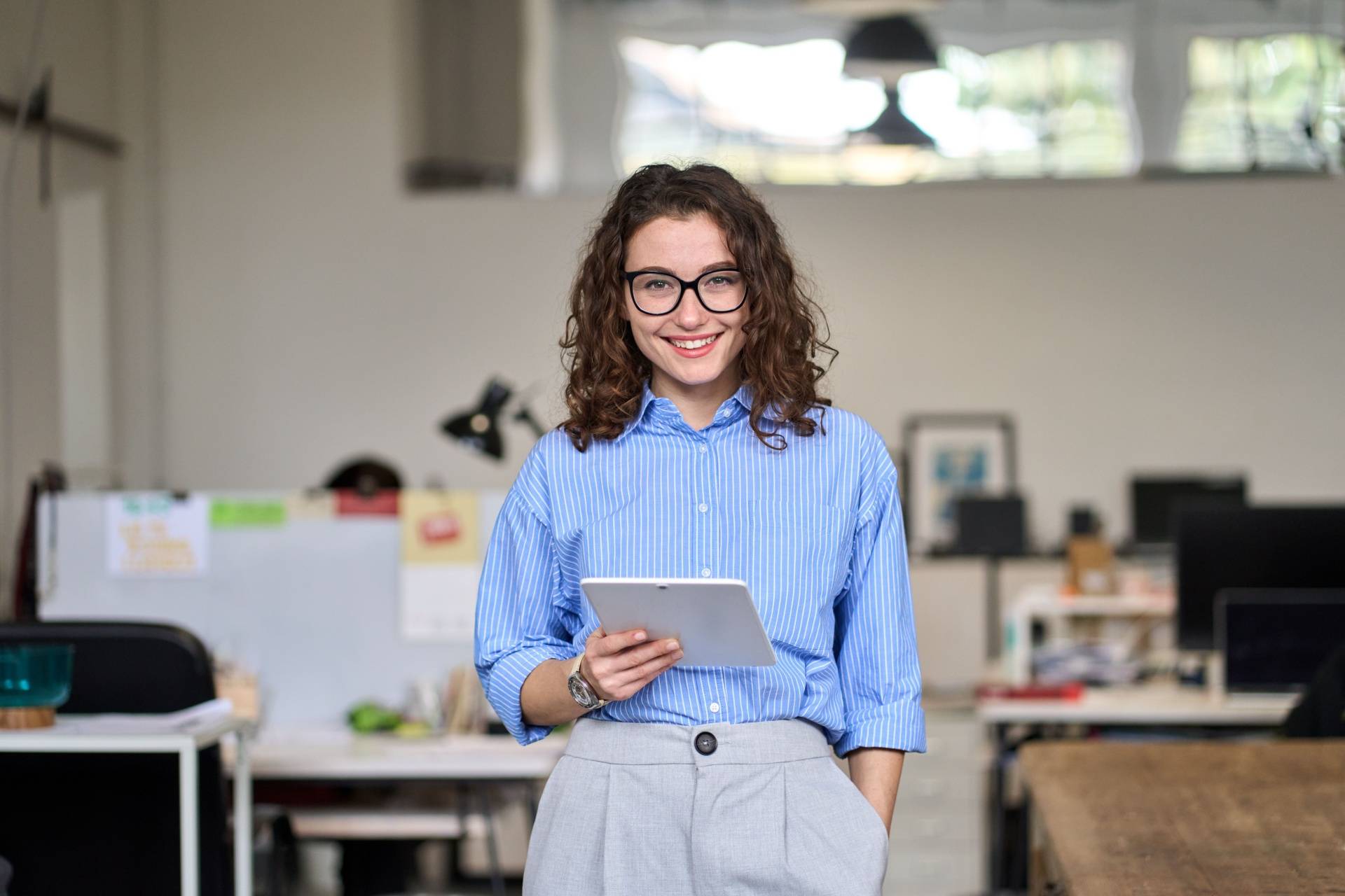 Smiling corporate professional in an office