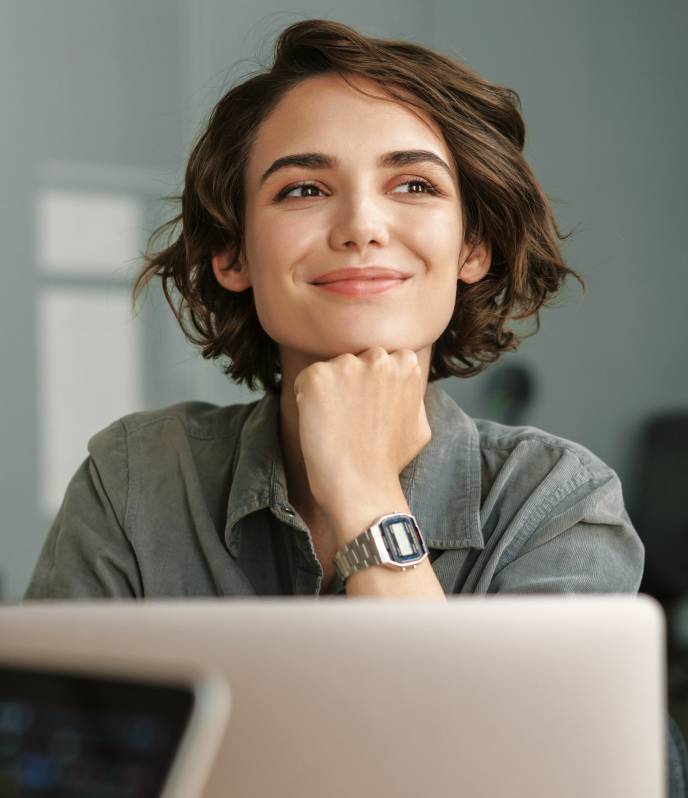 Smiling working professional in an office