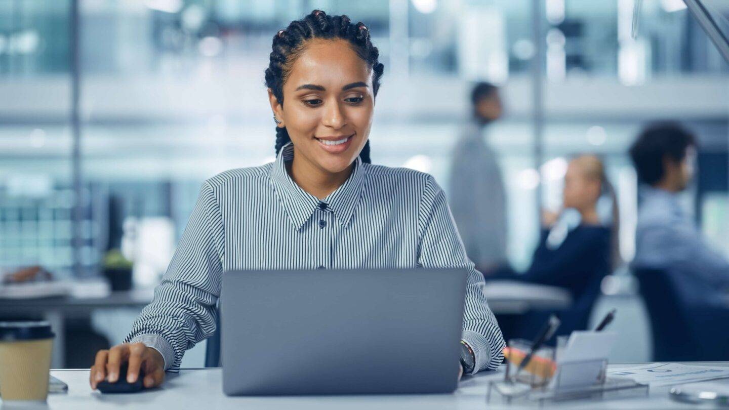 Female professional working at laptop